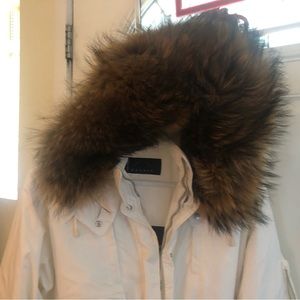 One piece Bogner white ski suit with fur hood